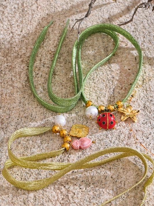 Green rope pearl ladybird heart charm - product image