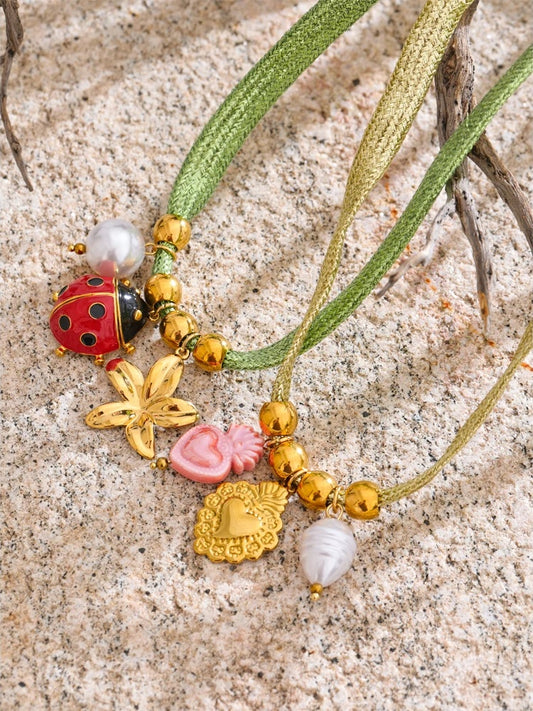 Green rope pearl ladybird heart charm - product image