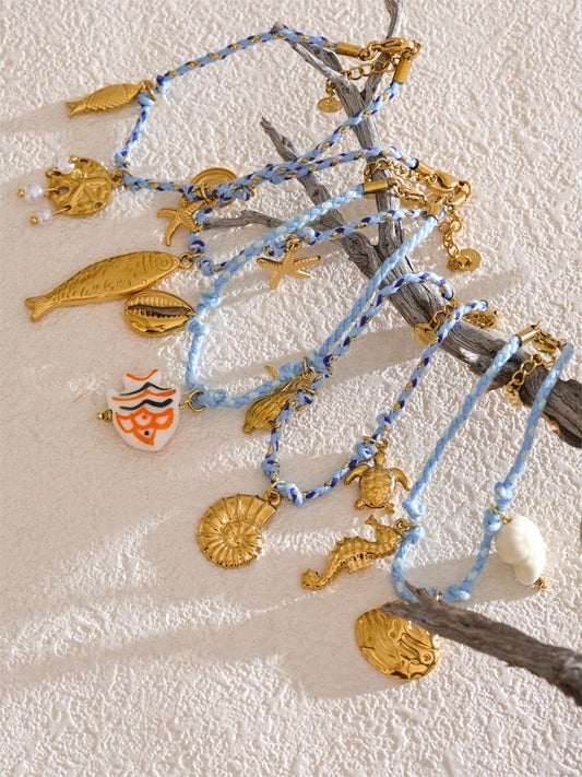 Handmade rope braided starfish shell drop bracelet - product image
