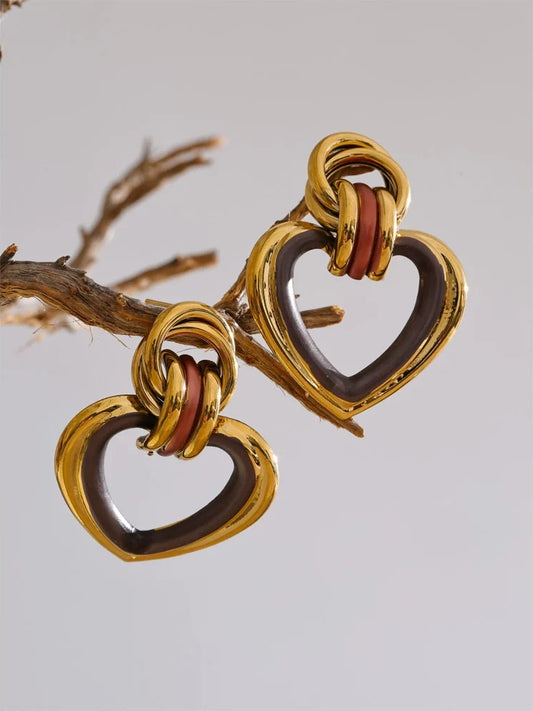 Heart contemporary hollow stud earrings - product image