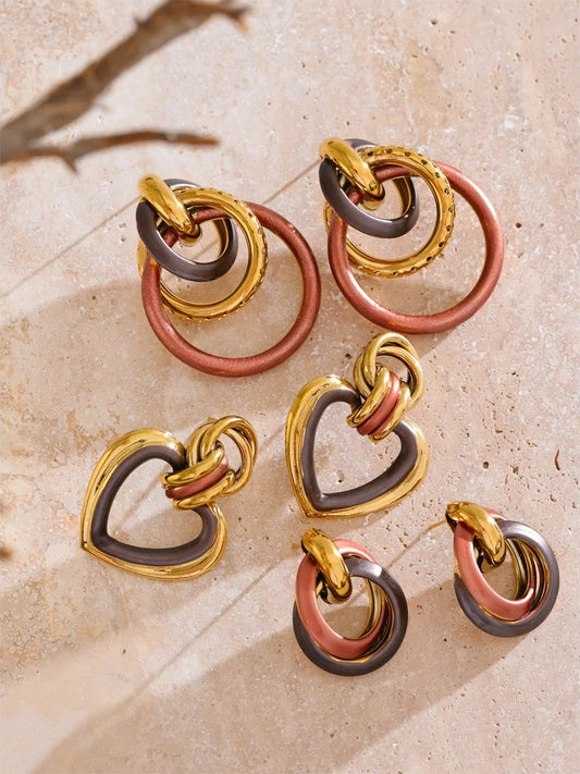 Heart contemporary hollow stud earrings - product image