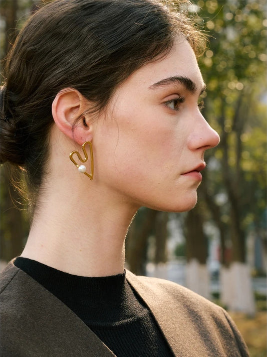 Heart hollow stud simulated pearl earrings - product image