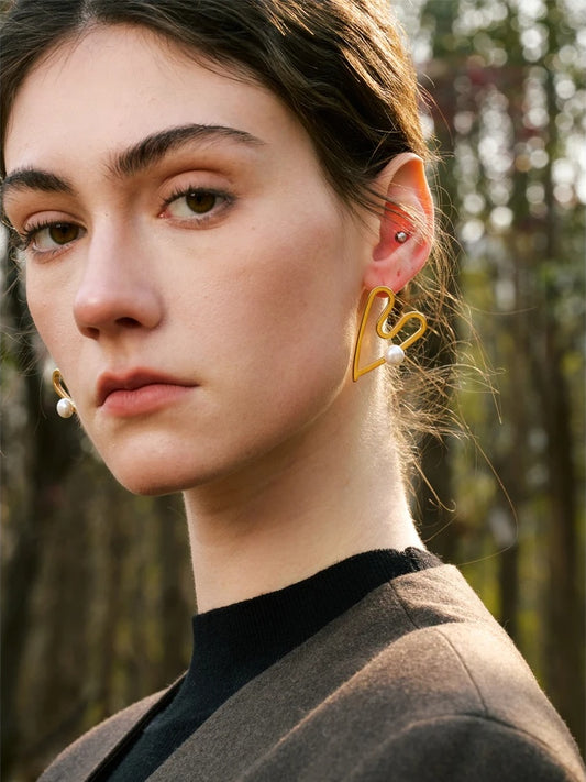 Heart hollow stud simulated pearl earrings - product image