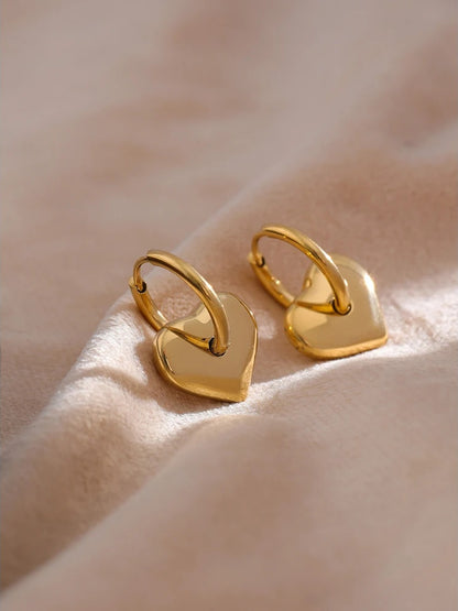 Heart huggie abstract golden fashion hoop earrings - product image