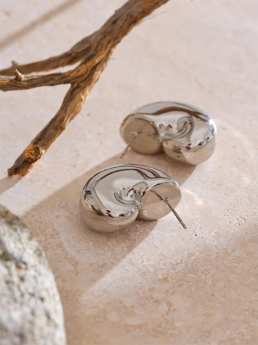 Hollow chunky textured unusual stud earrings - product image