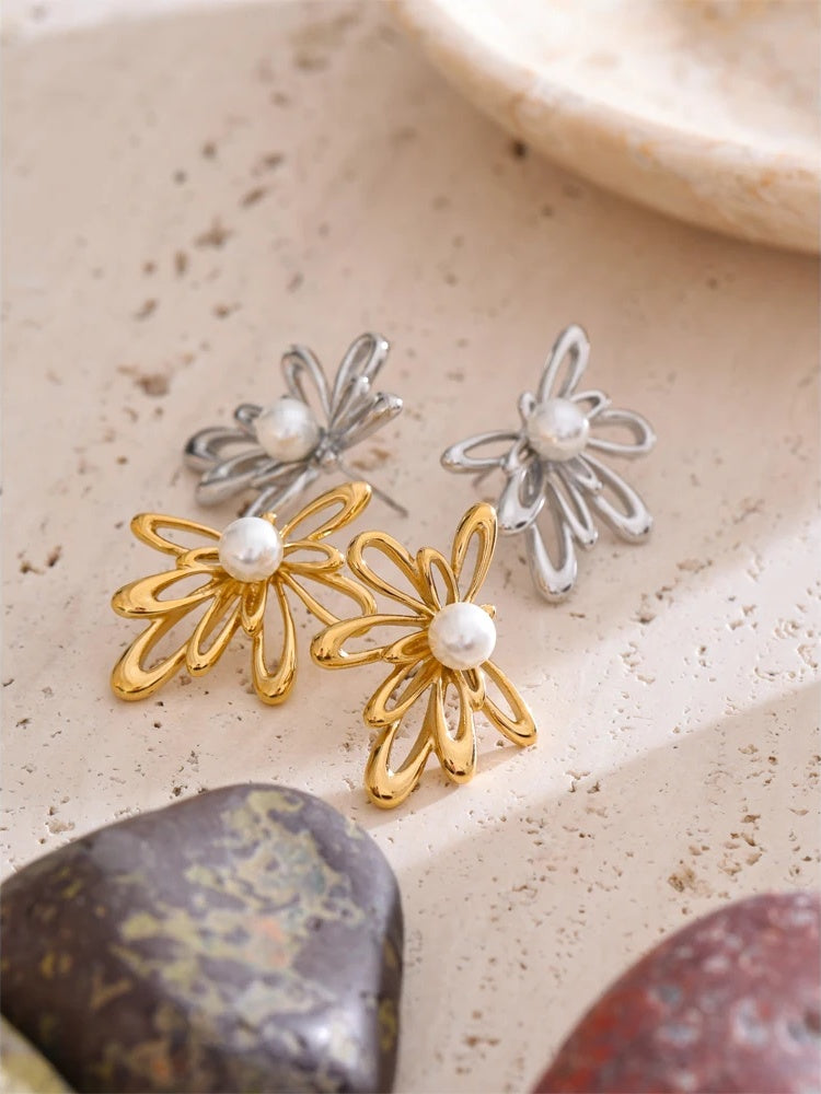 Hollow flower imitation pearls stud earrings - product image