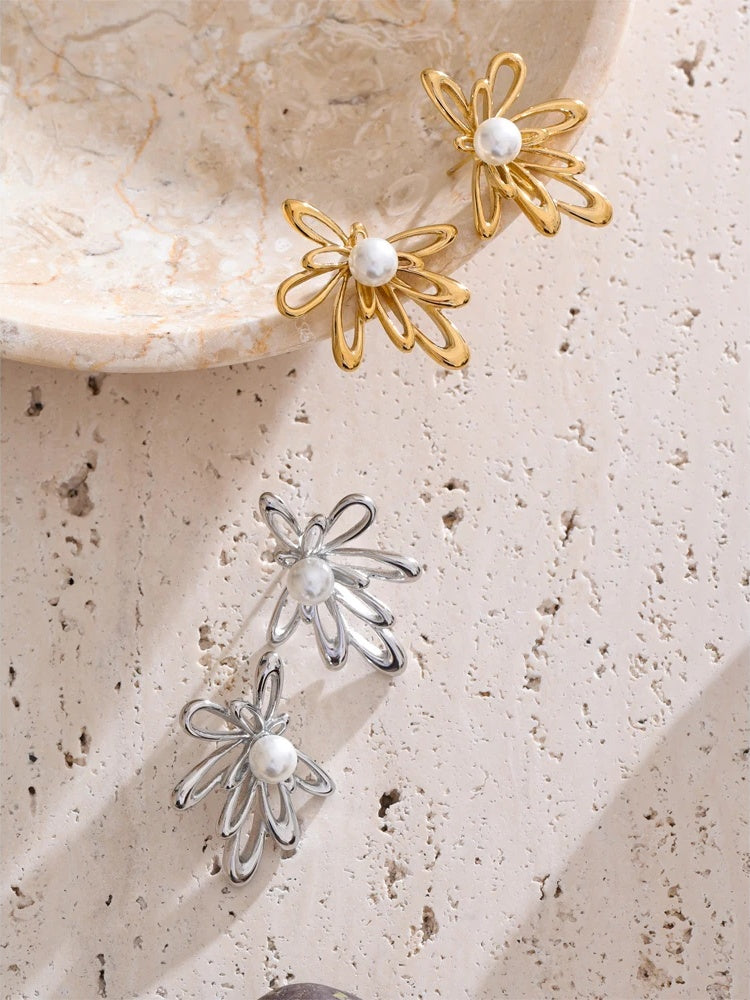 Hollow flower imitation pearls stud earrings - product image