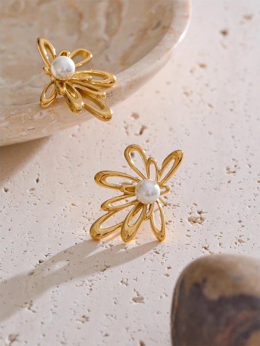 Hollow flower imitation pearls stud earrings - product image