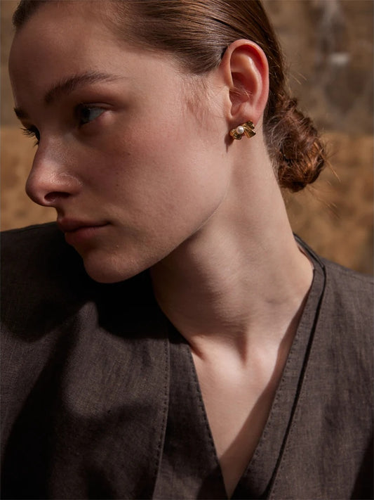 Imitation pearls bowknot stud earrings - product image