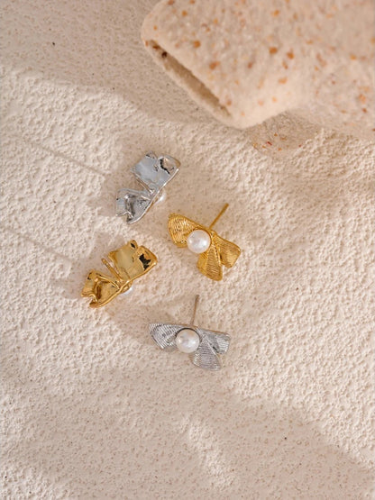 Imitation pearls bowknot stud earrings - product image