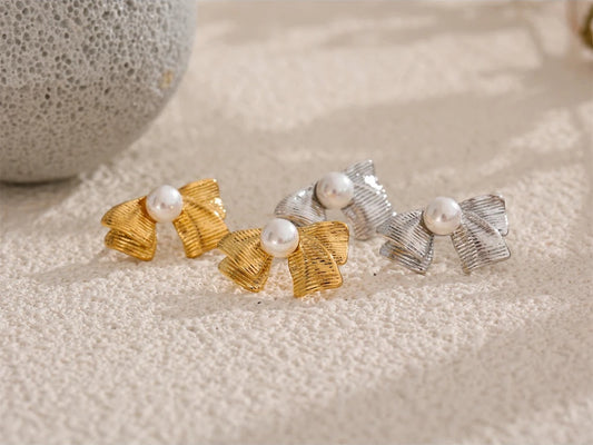 Imitation pearls bowknot stud earrings - product image