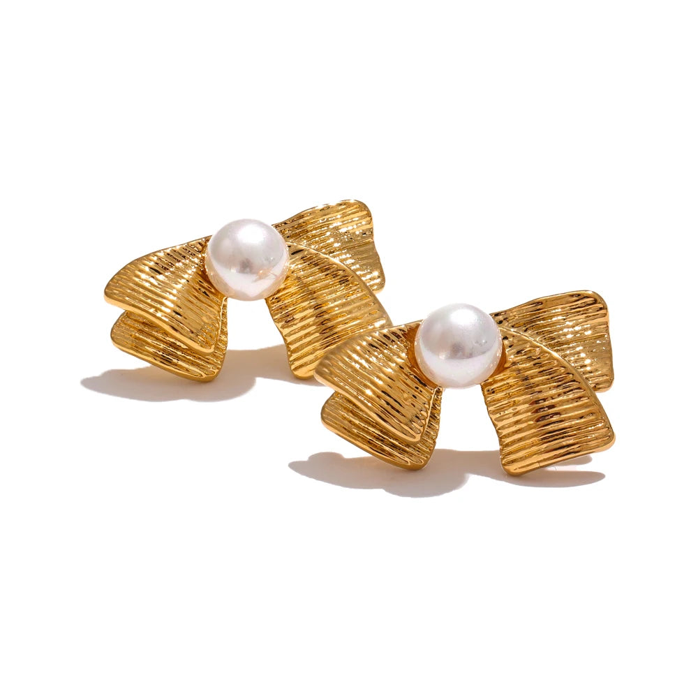 Imitation pearls bowknot stud earrings - product image