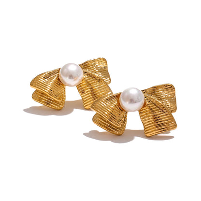 Imitation pearls bowknot stud earrings - product image