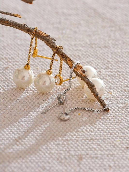 Imitation pearls long chain dangle earrings - product image