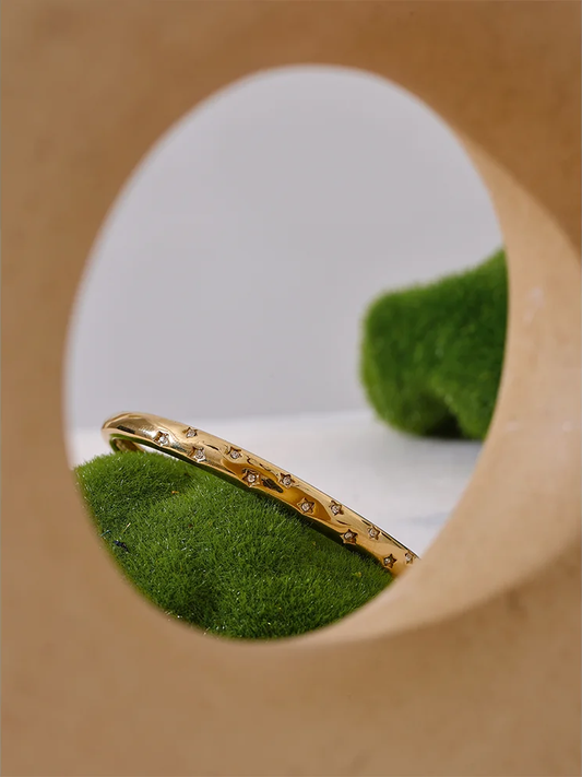 Inlaid cubic zirconia star open cuff gold color bracelet - product image