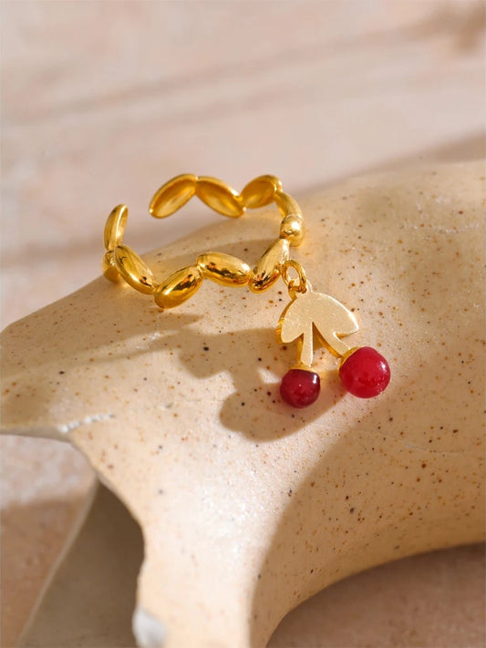 Irregular resin cherry drop adjustable gold color ring - product image