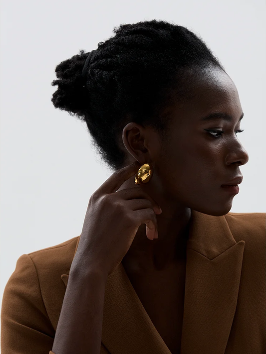Irregular round smooth stud earrings - product image