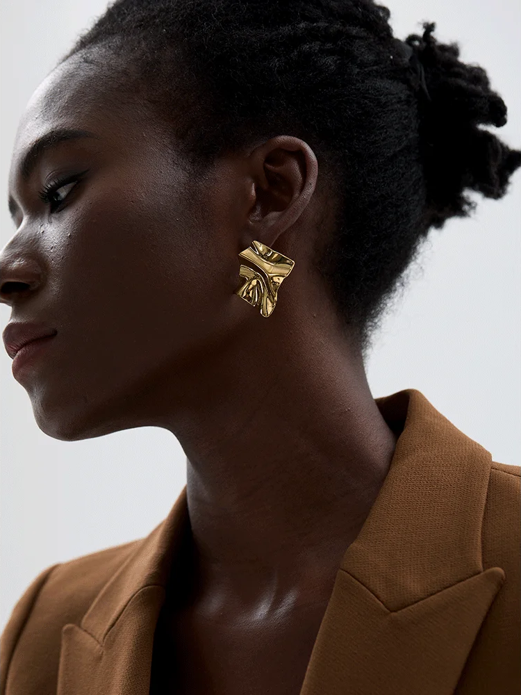Large abstract metal texture stud earrings - product image