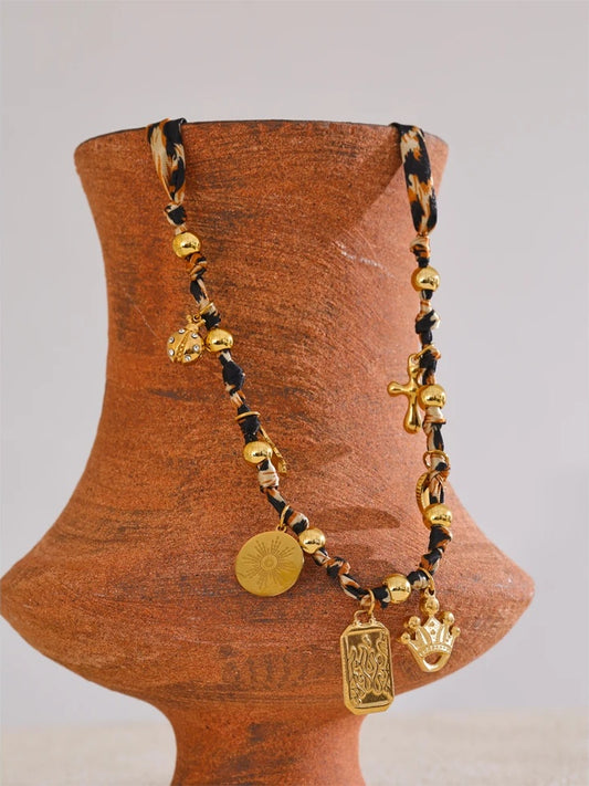 Leopard print butterfly heart cross pendant necklace - product image
