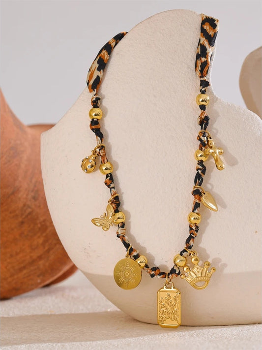 Leopard print butterfly heart cross pendant necklace - product image