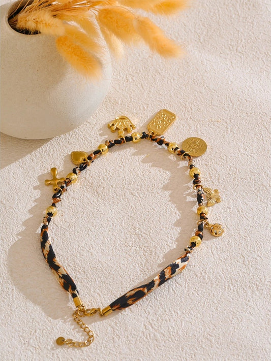 Leopard print butterfly heart cross pendant necklace - product image