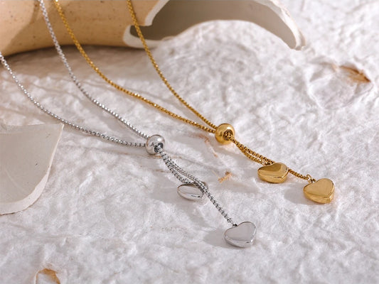 Long heart pendant gold color pull-out necklace - product image