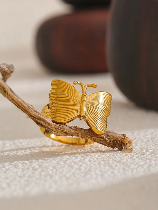 Metal cast integrated butterfly modern ring - product image