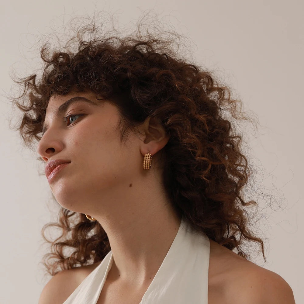 Metal gold hoop beaded hug earrings - product image