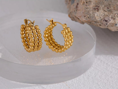 Metal gold hoop beaded hug earrings - product image