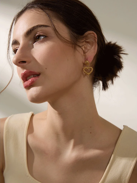 Metal heart hollow drop earrings - product image