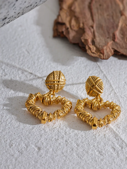 Metal heart hollow drop earrings - product image