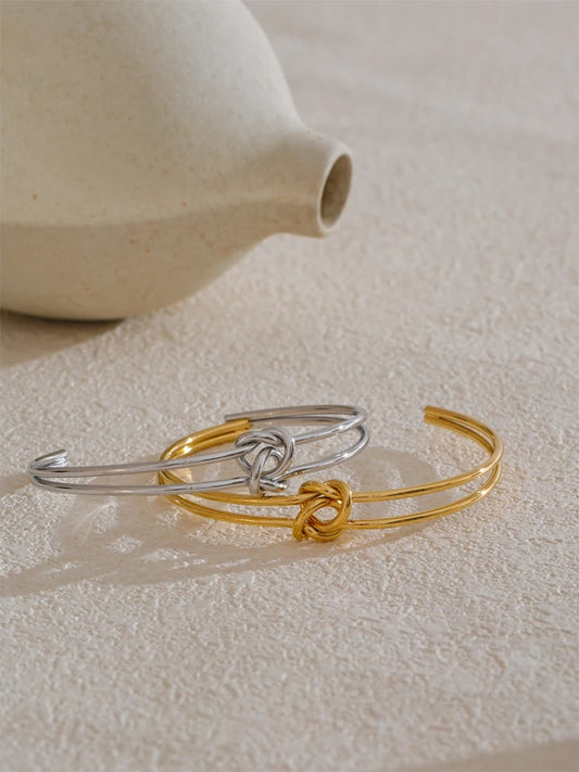 Metal knot open cuff water resistant bracelet - product image