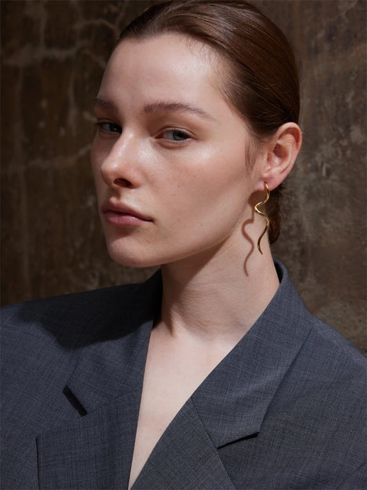 Metal modern flowing long stud earrings women - product image