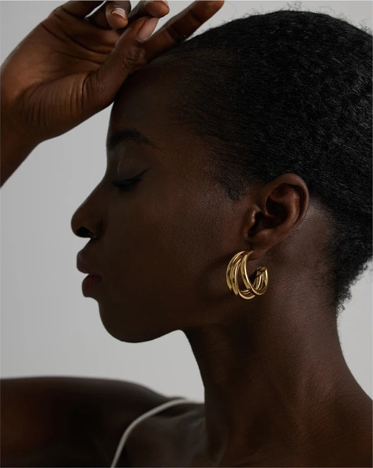 Minimalist gold color hoop statement earrings - product image