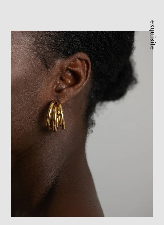 Minimalist gold color hoop statement earrings - product image