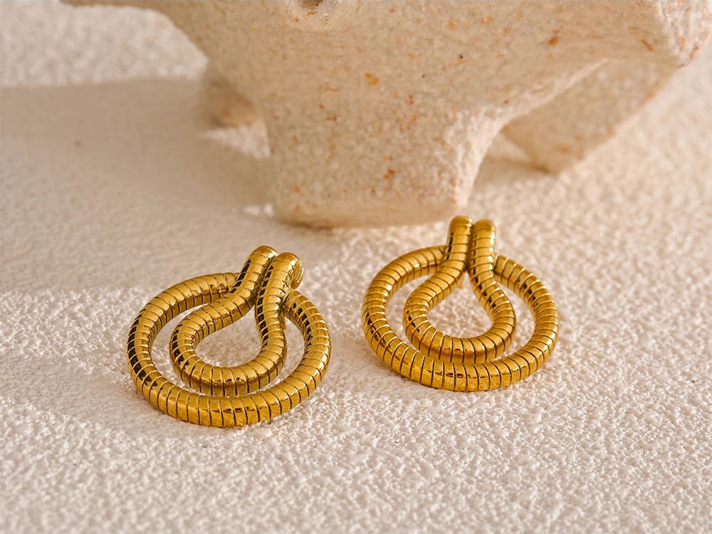 Minimalist snake stud earrings - product image