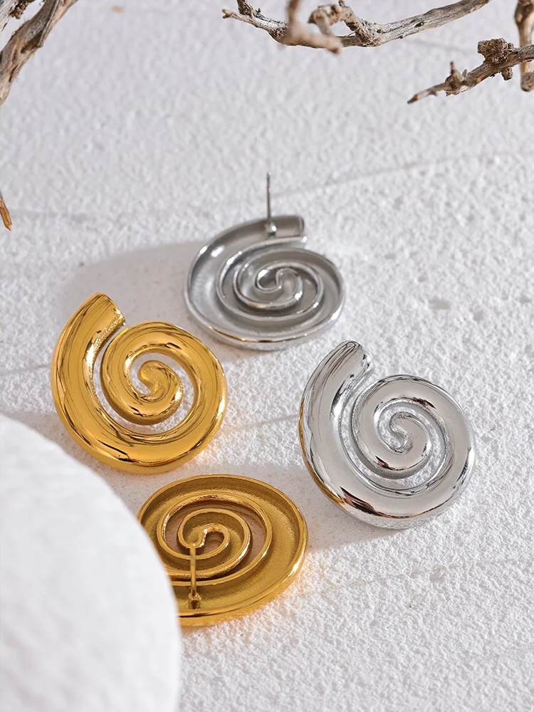 Modern conch stud earrings - product image