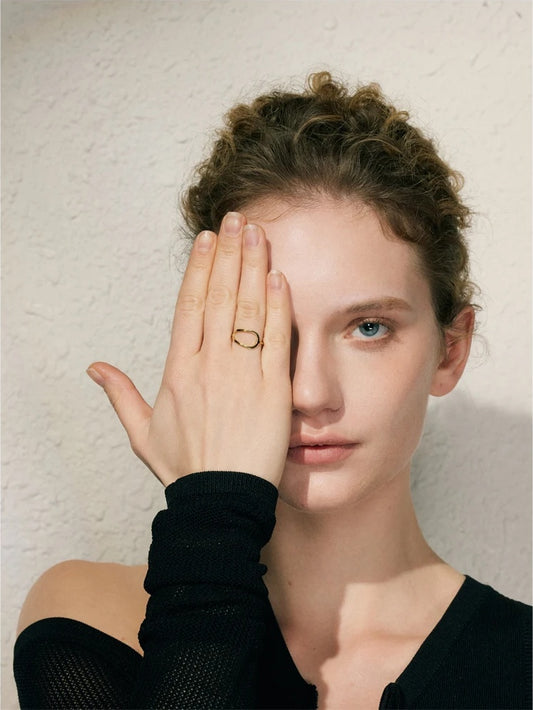 Modern hollow adjustable c-shape finger ring - product image