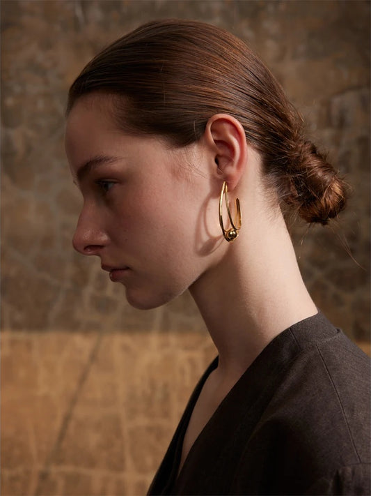 Modern huggie hoop earrings gold platinum - product image