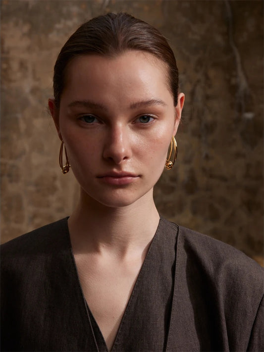 Modern huggie hoop earrings gold platinum - product image