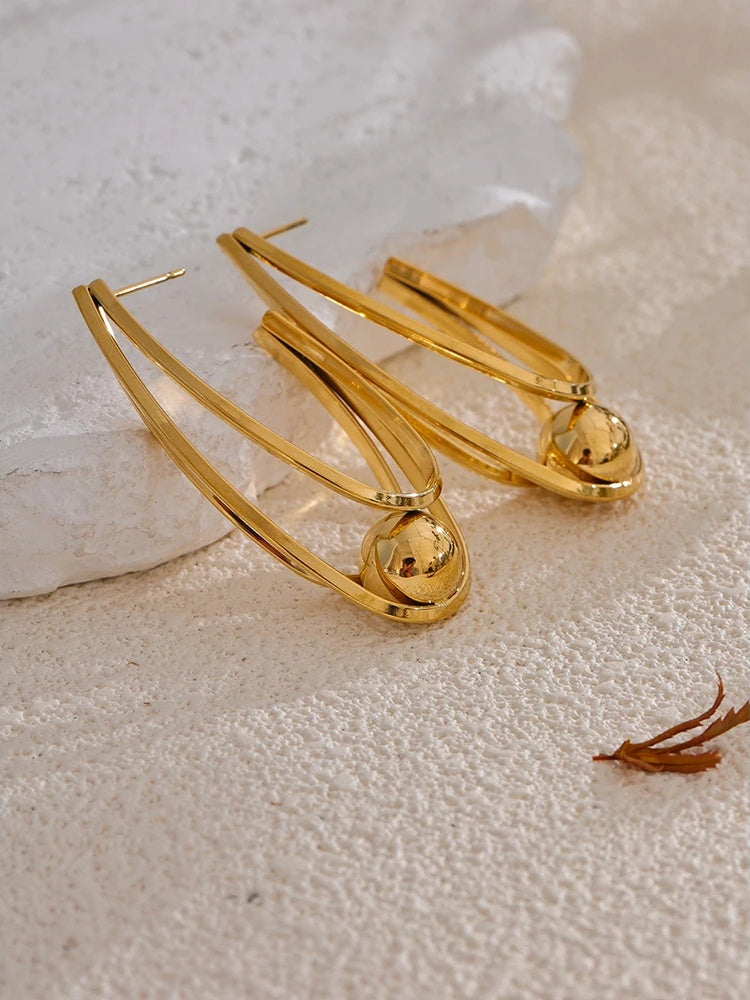 Modern huggie hoop earrings gold platinum - product image