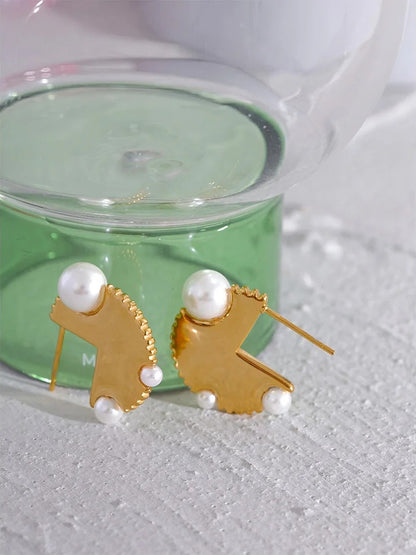 Modern round hoop imitation pearl earrings - product image