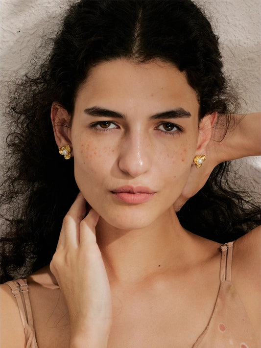 Pearl flower small plant stud earrings - product image