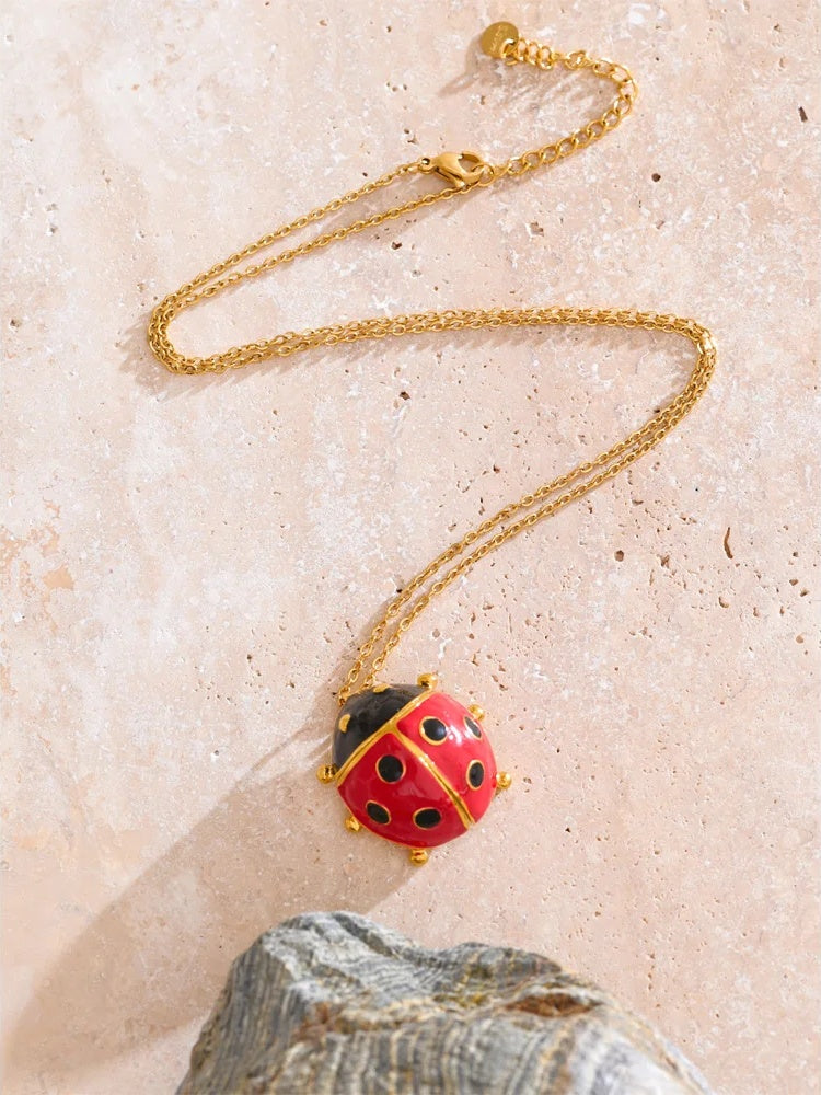 Red enamel ladybird insect pendant necklace - product image