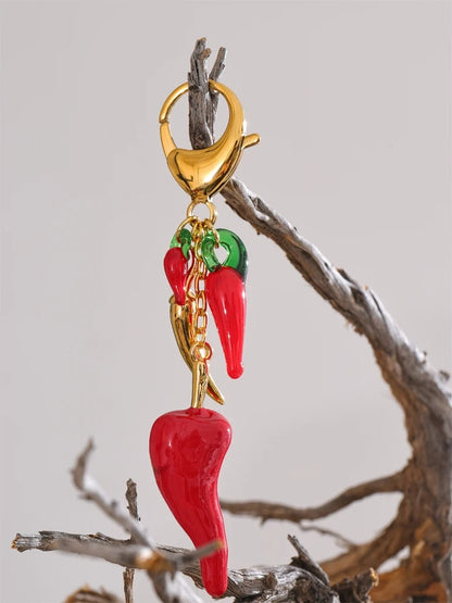 Red enamel resin chilli handbag keychain pendant - product image