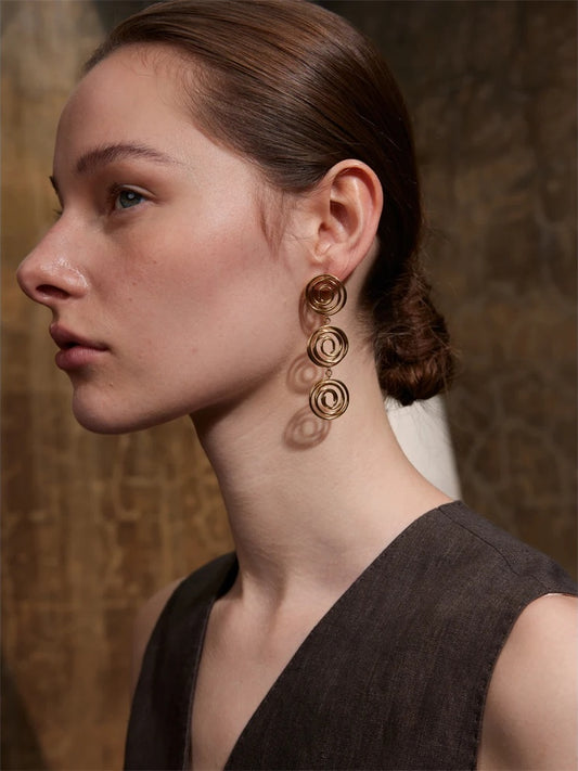 Round hollow long drop contemporary earrings - product image