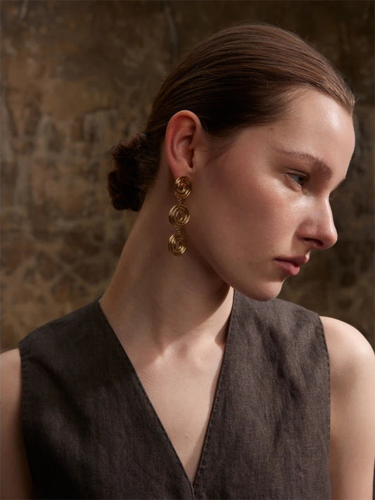 Round hollow long drop contemporary earrings - product image