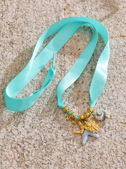 Shoelace heart starfish shell charm pendant - product image