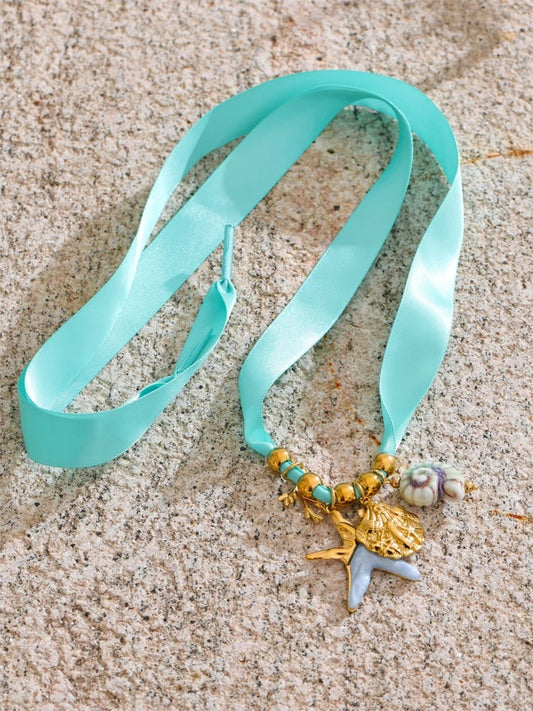 Shoelace heart starfish shell charm pendant - product image