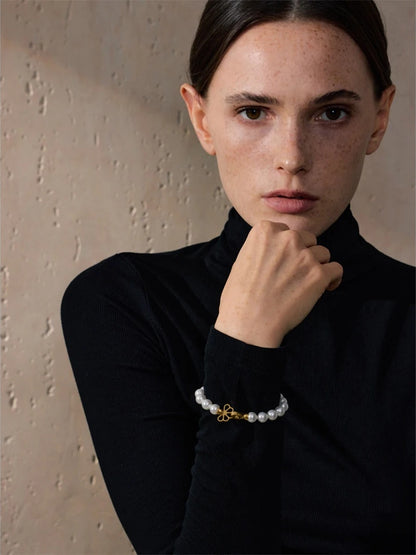Simulated pearl beads handmade charm bracelet - product image